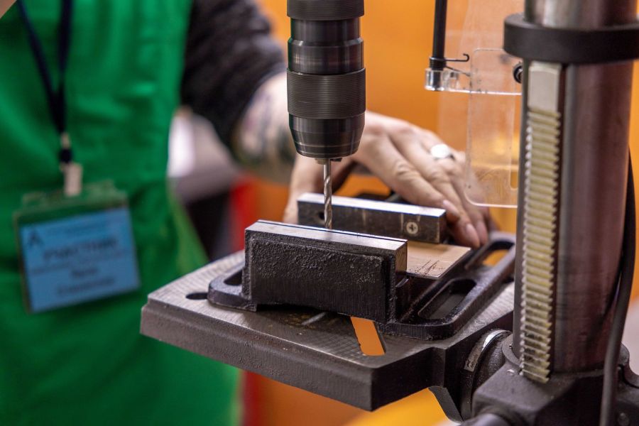 close up of a drill press in action